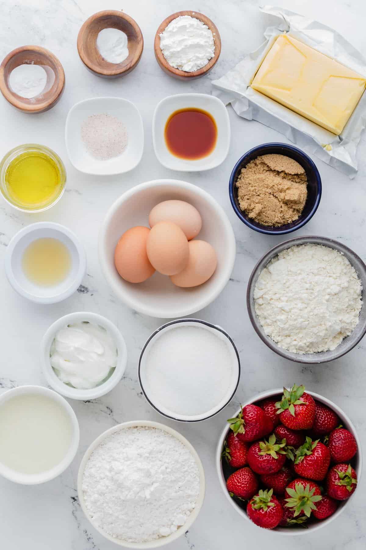 Ingredients to make a strawberry cake.
