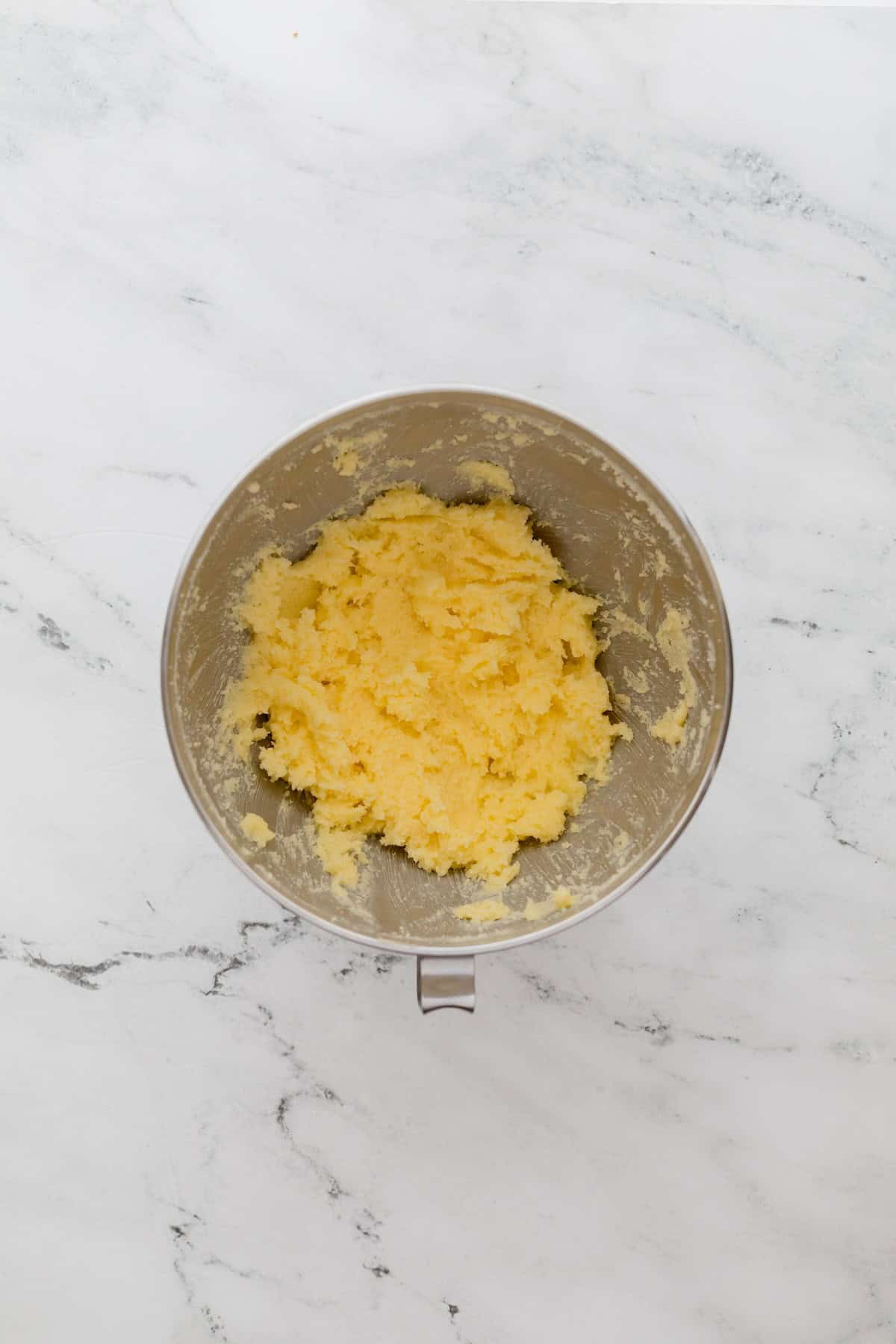 Creamed butter and sugar in a mixing bowl.