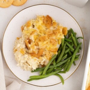 Poppy seed casserole with a side of green beans.