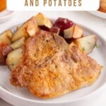 Oven baked pork chops and potatoes.