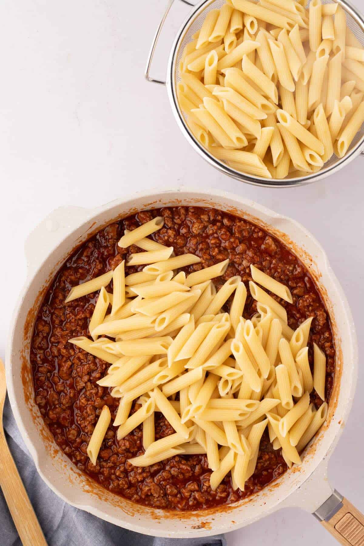 Sloppy joe meat with penne pasta added to it.