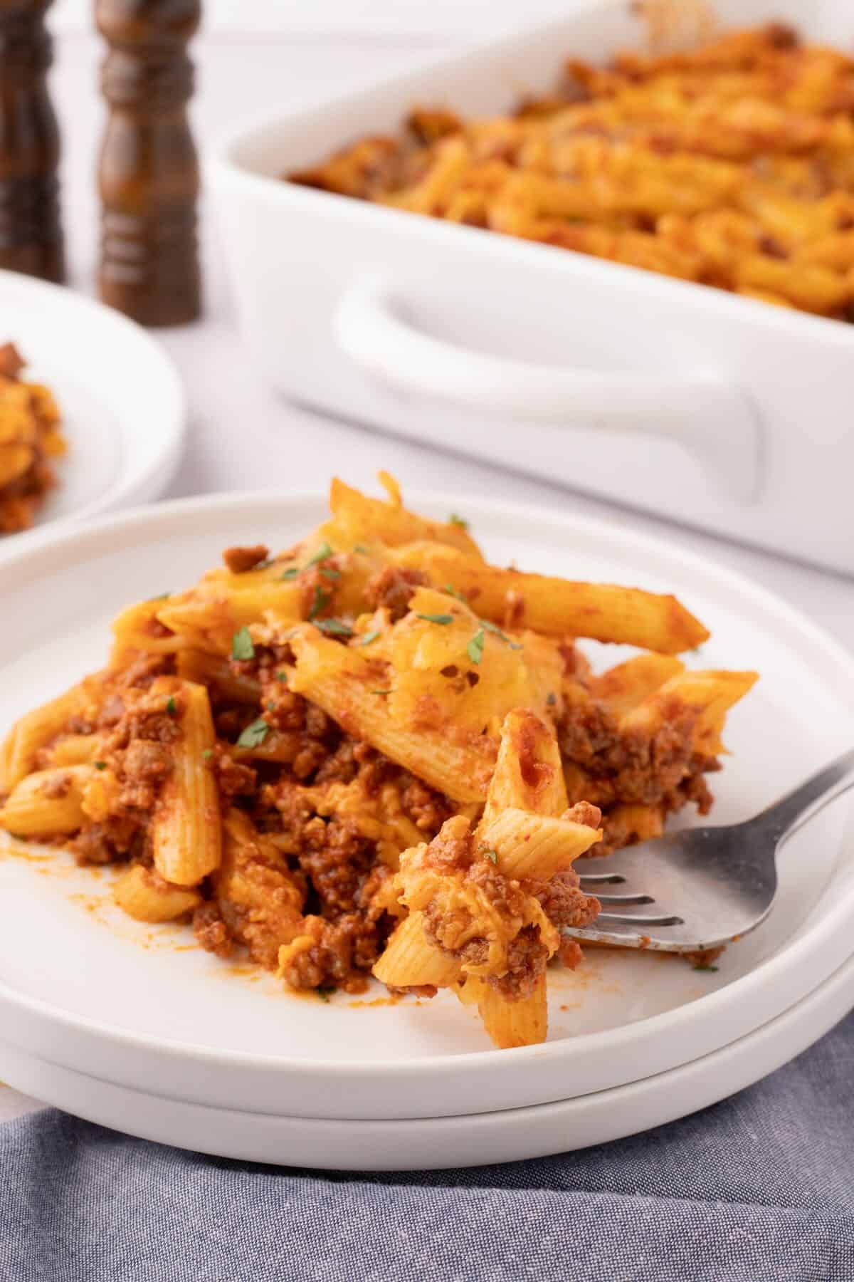 Savory ground beef and tomato pasta casserole on a plate.