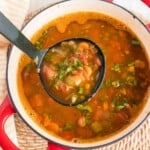 A pot full of lentil vegetable soup.