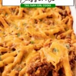 Easy sloppy joe casserole on a wooden spoon.