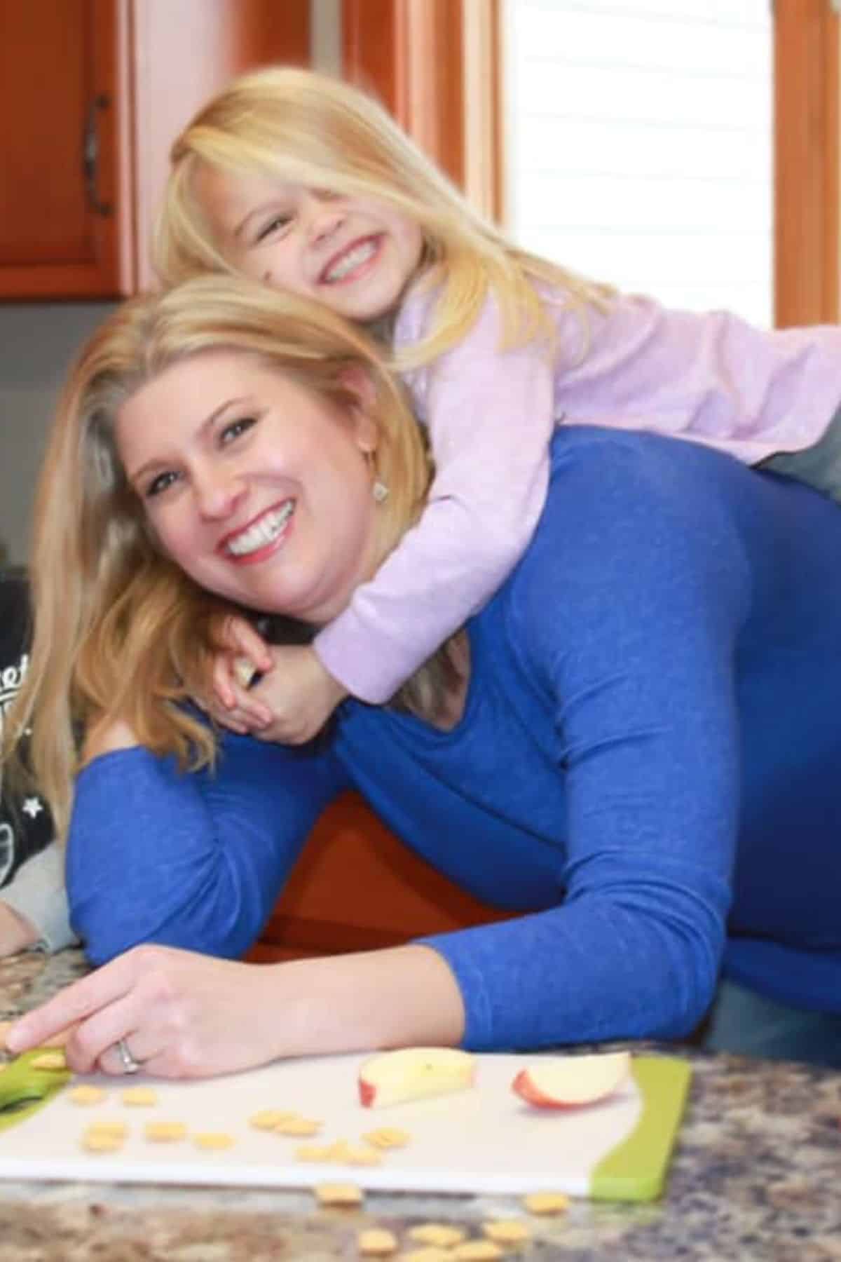 This Farm Girl Cooks and her daughter in their midwest kitchen.
