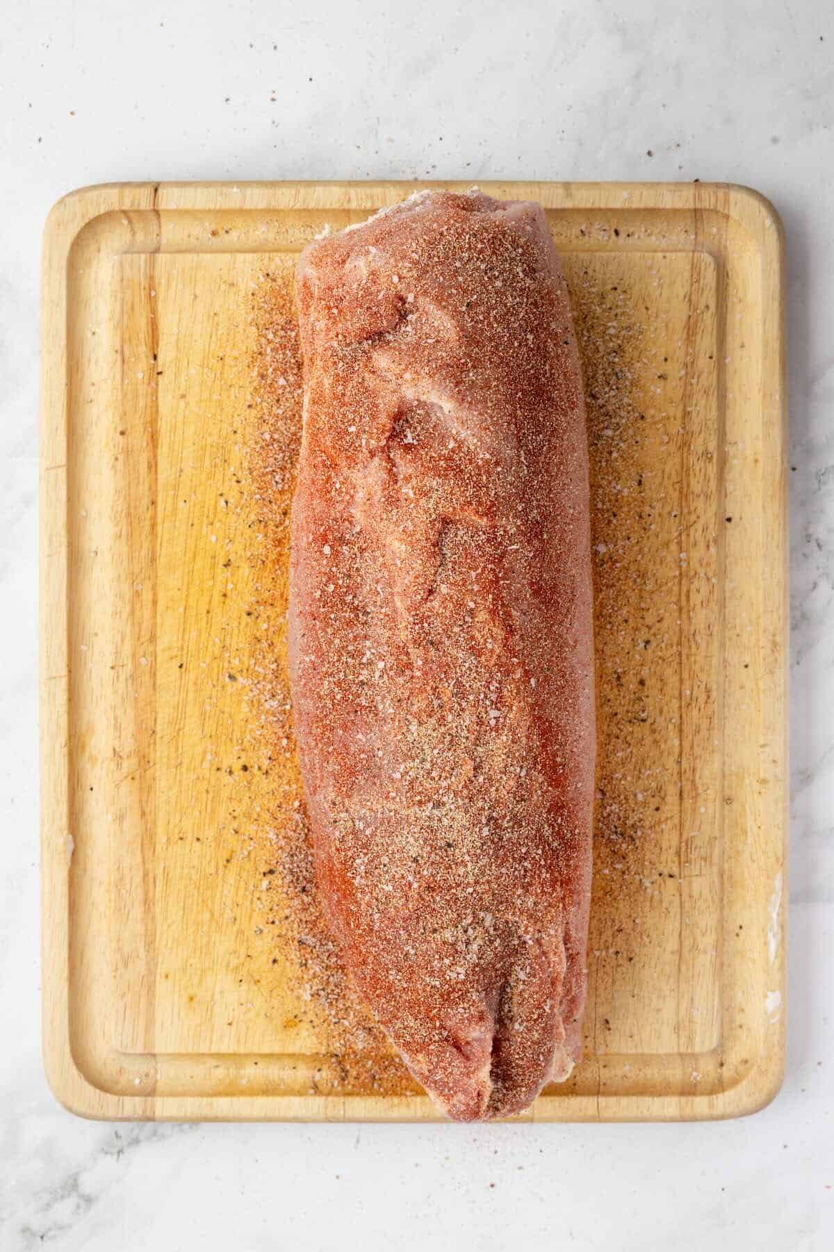 Stuffed pork loin rolled up and seasoned with paprika, garlic powder, salt, and pepper.