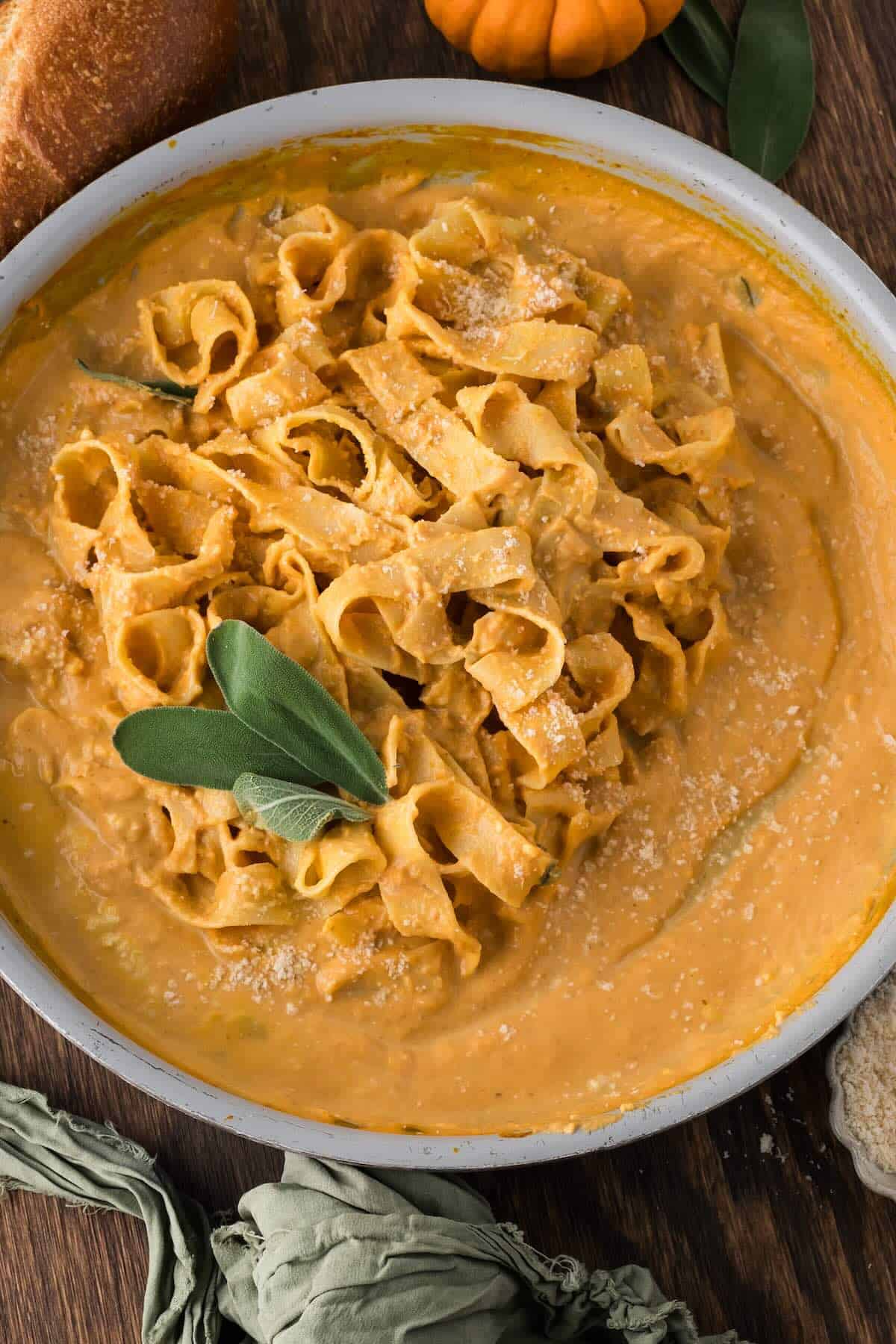 Creamy pumpkin pasta sauce tossed with pasta.