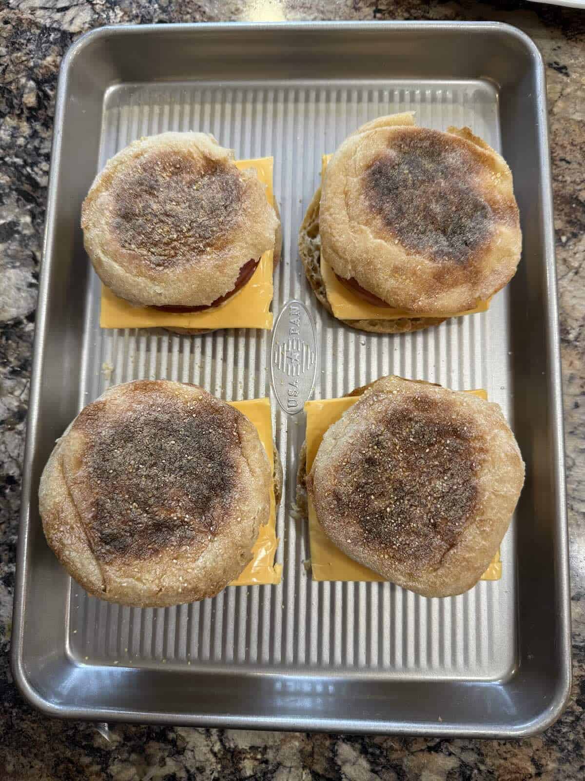 Assembled homemade egg breakfast sandwiches.