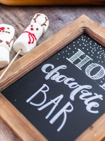 Hot chocolate bar feature on chalkboard sign.