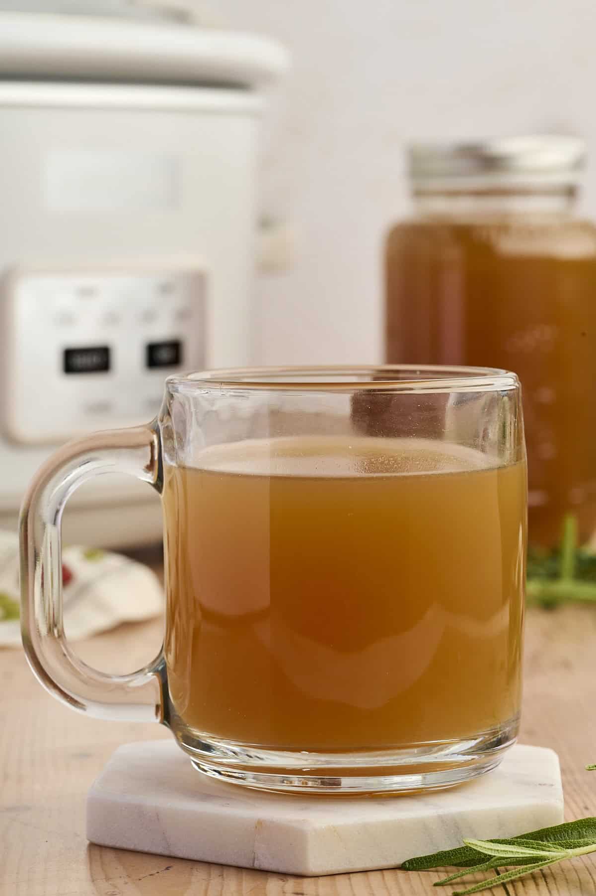 A mug of homemade chicken bone broth for sipping.
