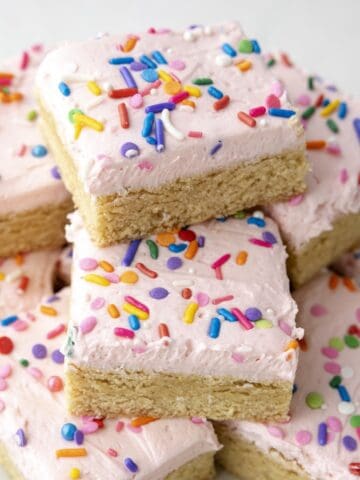Close-up of soft and chewy frosted sugar cookie bar.