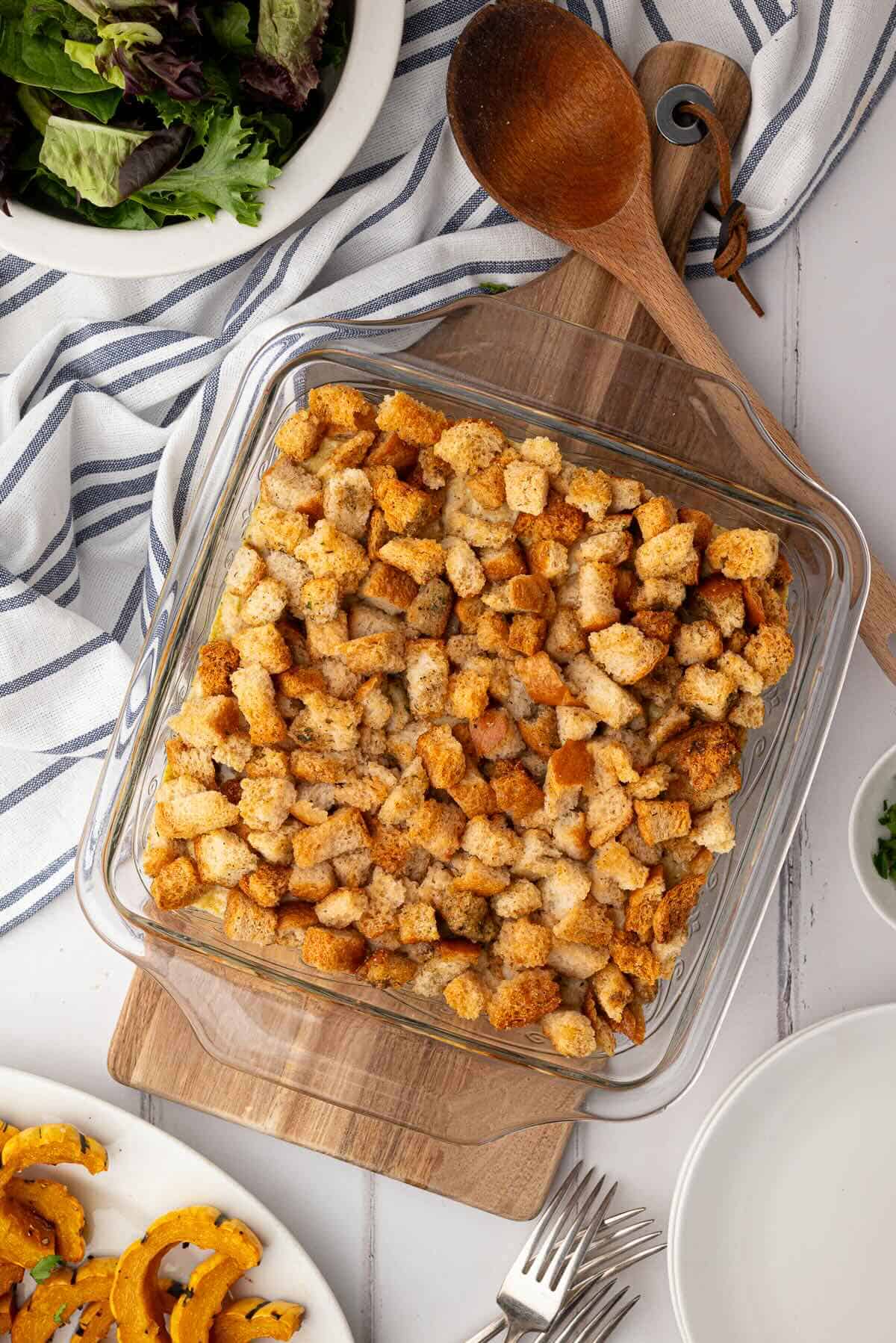 Hot chicken and stuffing bake just out of the oven, golden brown and bubbling around the edges.