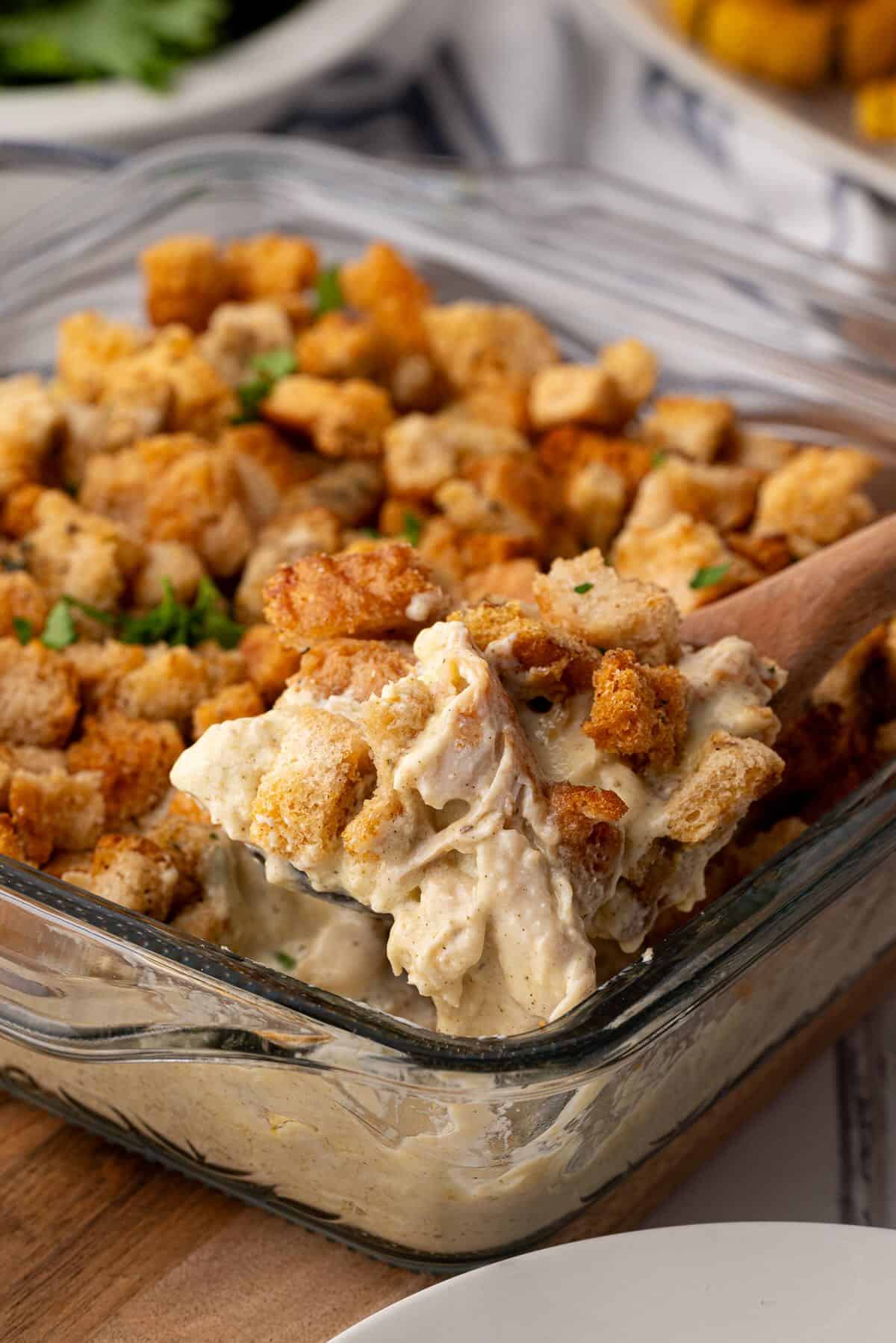 Comforting chicken and stuffing bake with creamy sauce and crispy crouton topping, ready to serve for dinner.