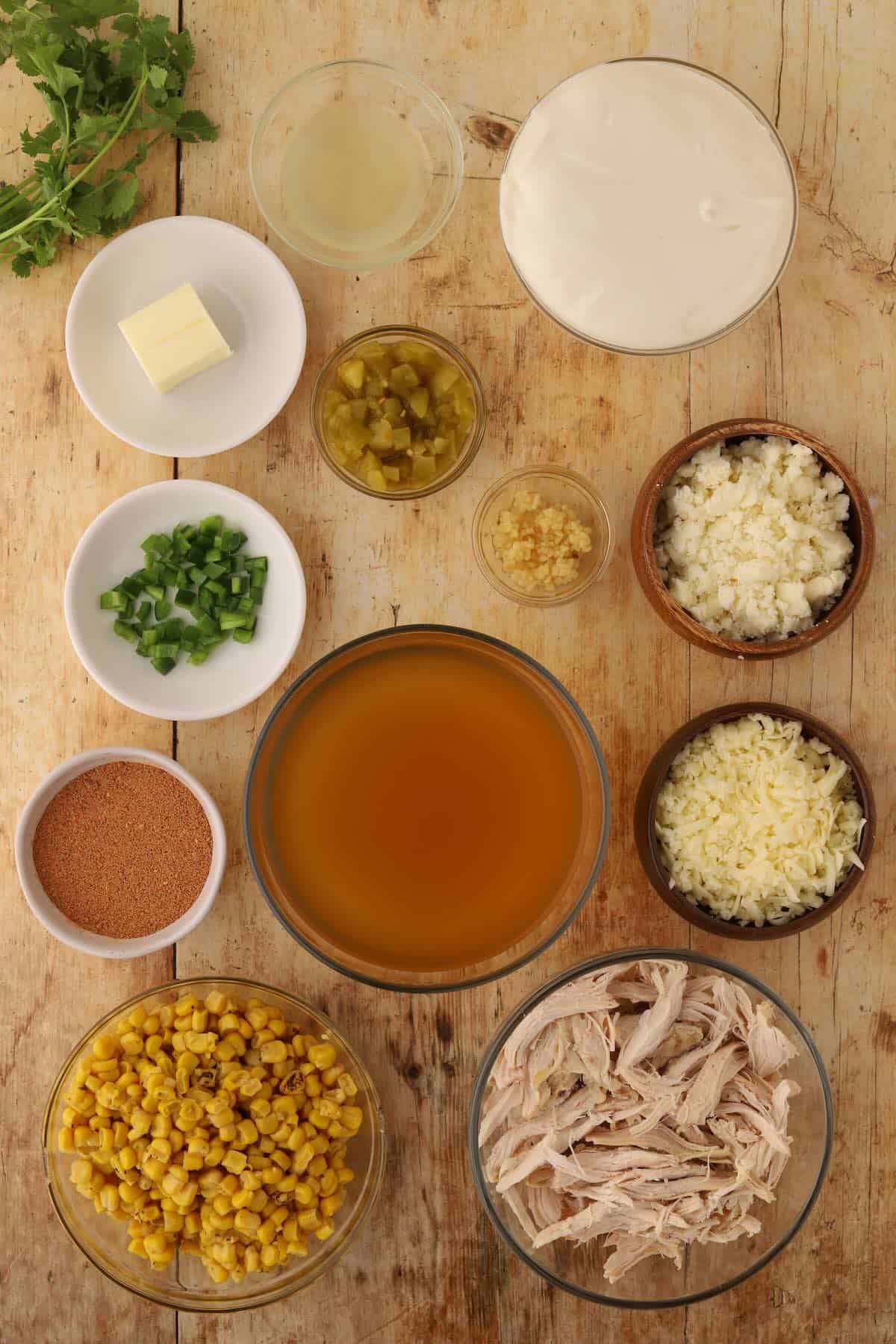 Ingredients to make a flavorful chicken and corn soup with a Tex-Mex flair.