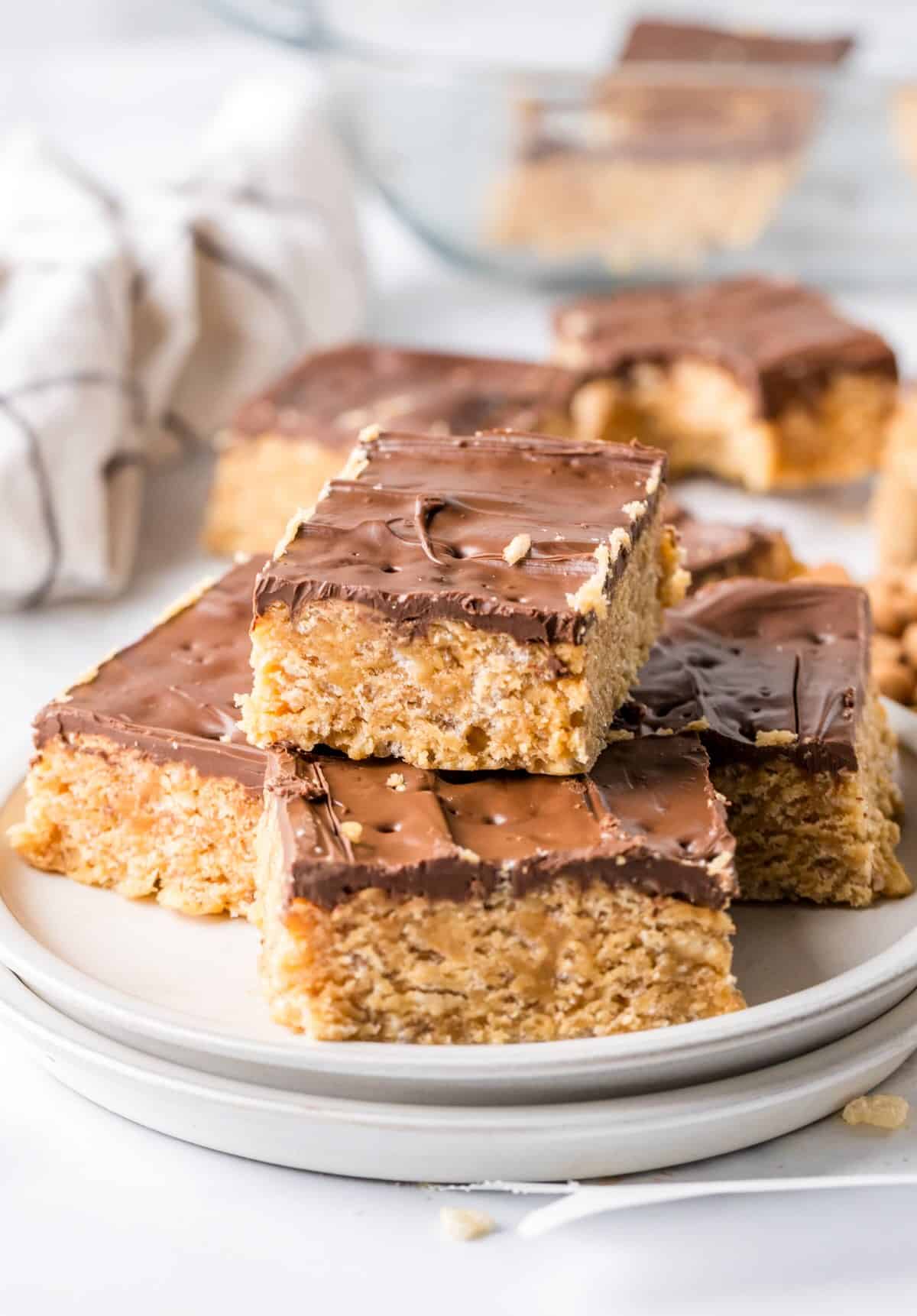 Scotcharoo squares on a plate to serve.