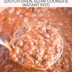 A ladle of hearty beef chili made for a crowd in a Dutch oven.