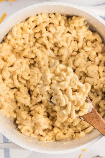 A pot of creamy mac and cheese with several cheeses, made on the stovetop.