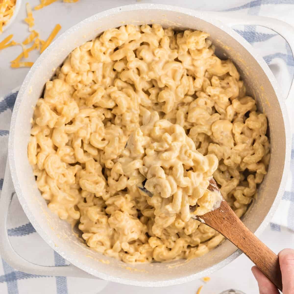 A pot of creamy mac and cheese with several cheeses, made on the stovetop.