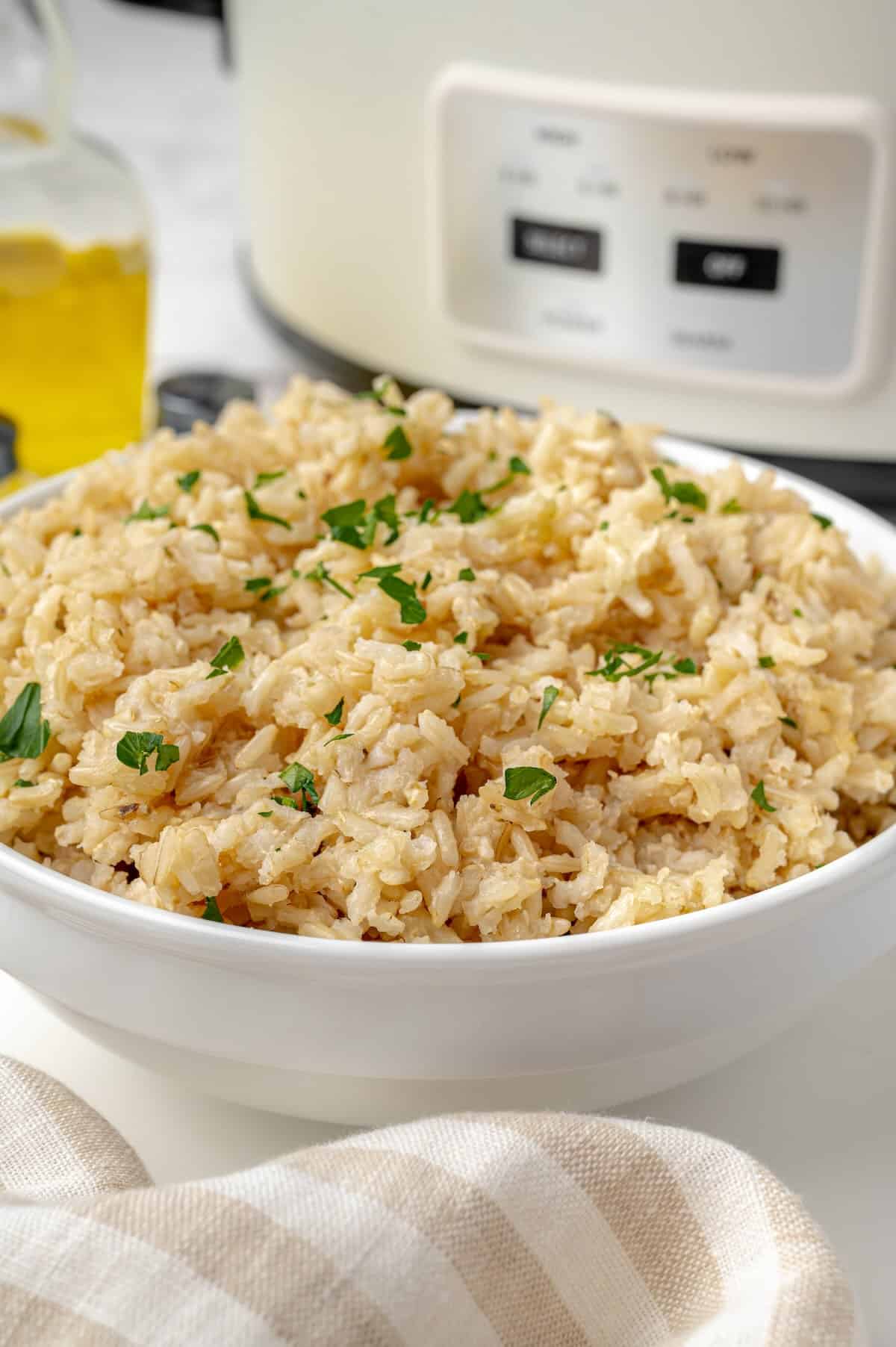 Serving bowl of slow cooker brown rice.