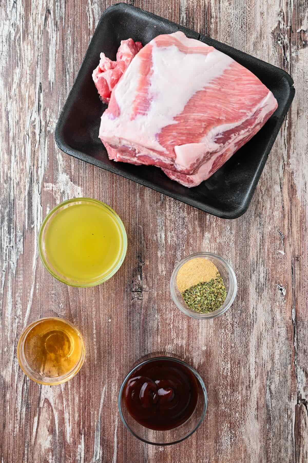 Pork shoulder, seasonings, chicken broth and bbq sauce to make a tender and juicy bbq pulled pork.