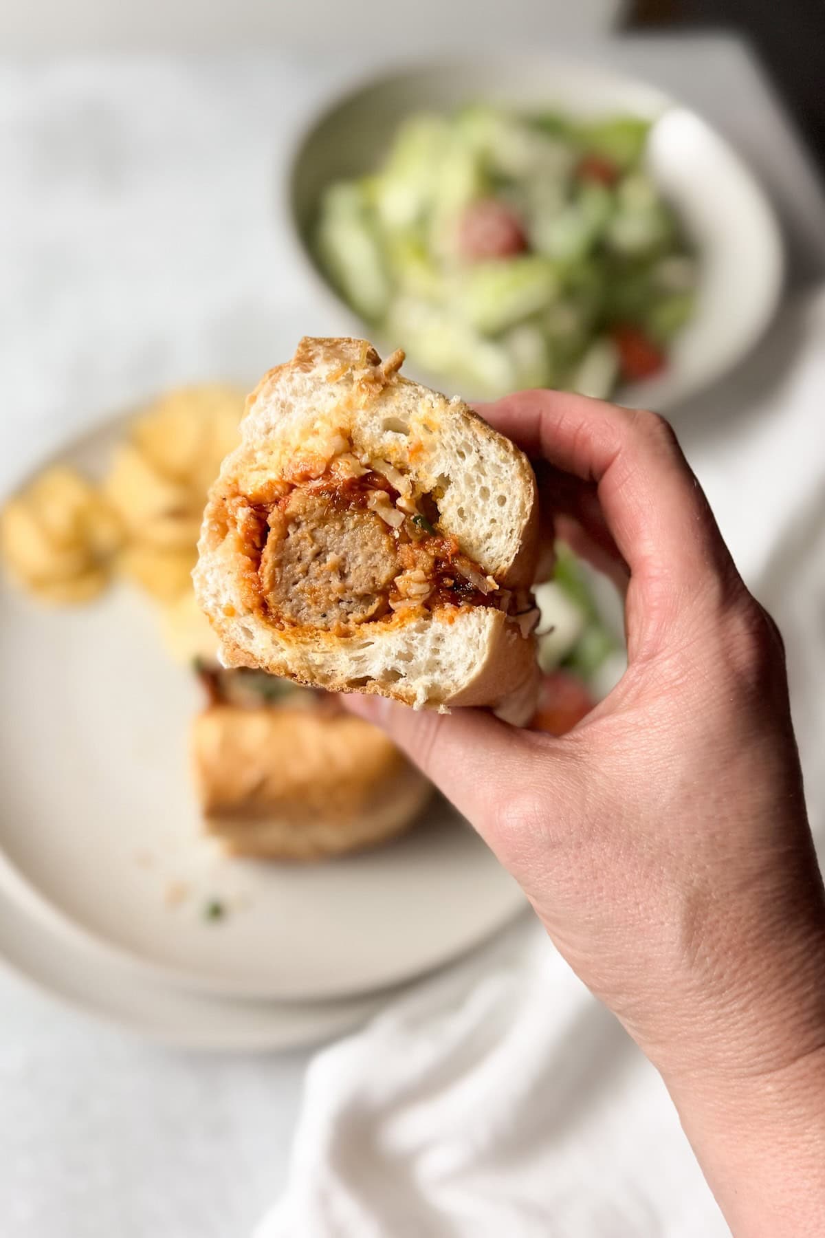 Easy meatball subs using frozen meatballs served on toasted rolls for a quick dinner.