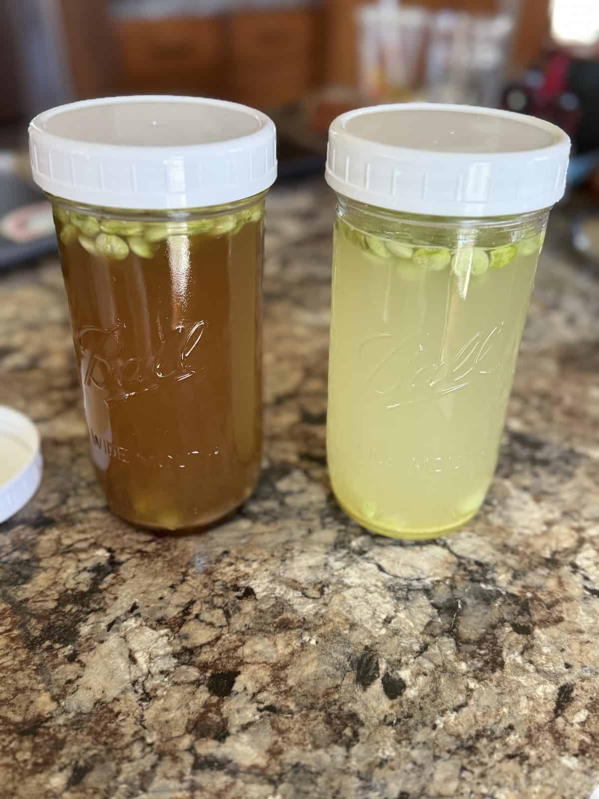 Broth stored in wide mouth mason jars for freezer storage.