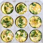 Mini crustless quiche with sausage and vegetables made in a muffin tin.
