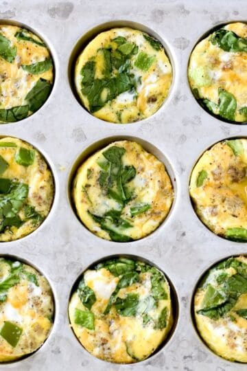 Mini crustless quiche with sausage and vegetables made in a muffin tin.