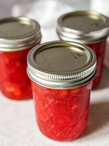 Easy strawberry freezer jam recipe with fresh strawberries.