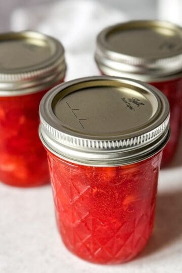Easy strawberry freezer jam recipe with fresh strawberries.