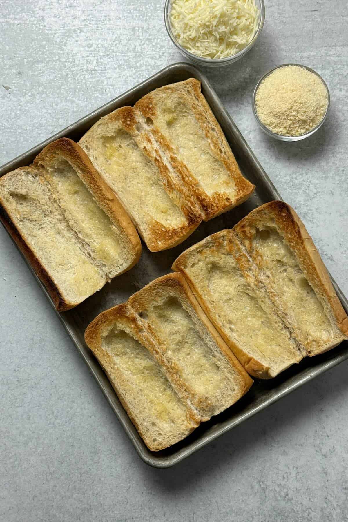 Toasted rolls sliced in half, brushed with butter and hollowed out for meatballs.