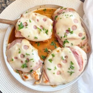 Easy chicken cordon bleu with a pan sauce on a plate for a weeknight supper.