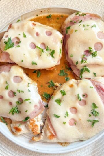 Easy chicken cordon bleu with a pan sauce on a plate for a weeknight supper.