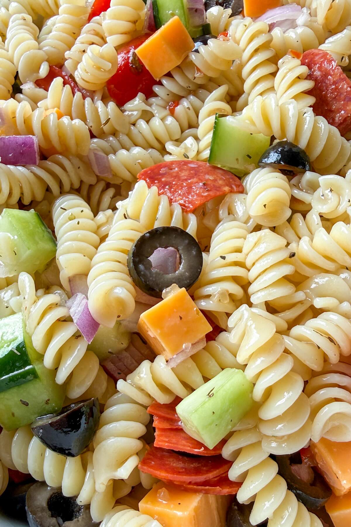 Classic Italian pasta salad ready to serve as a cold side dish for potlucks and BBQs.