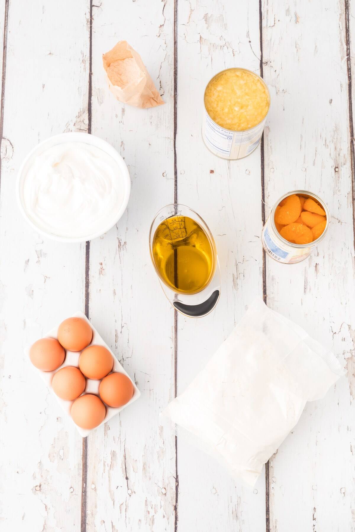 Ingredients to make a mandarin orange cake, also known as sunshine cake.