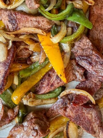 Beef fajitas made in the oven on a sheet pan.