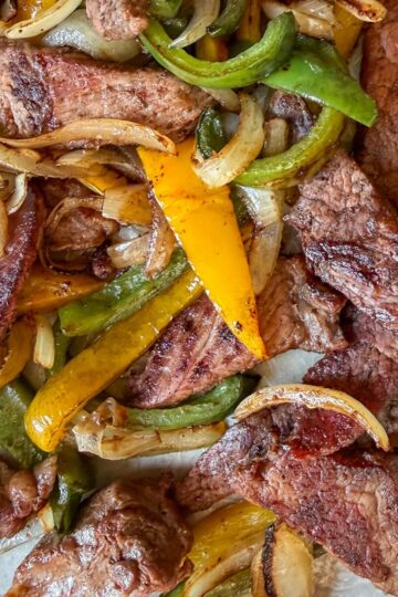Beef fajitas made in the oven on a sheet pan.