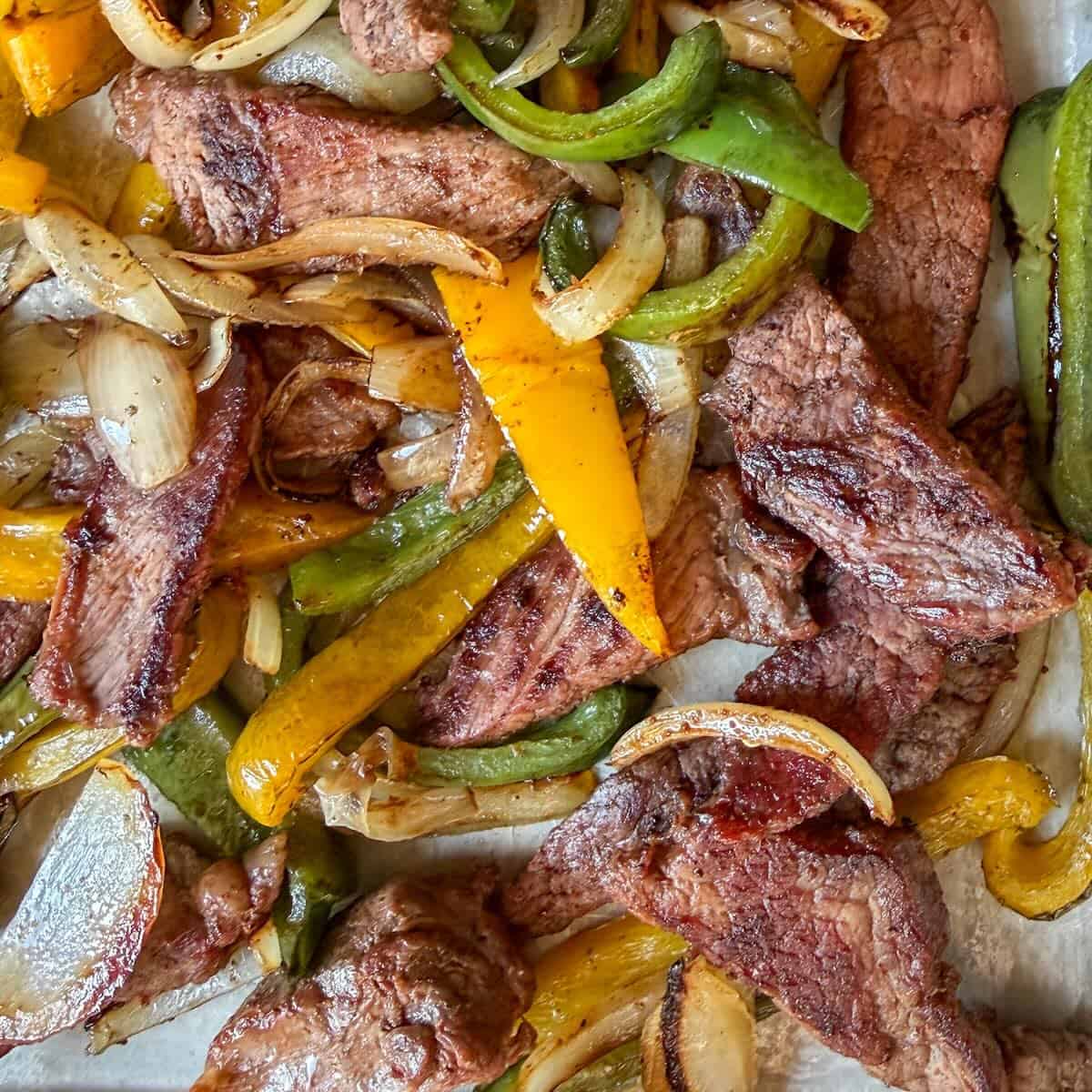 Beef fajitas made in the oven on a sheet pan.