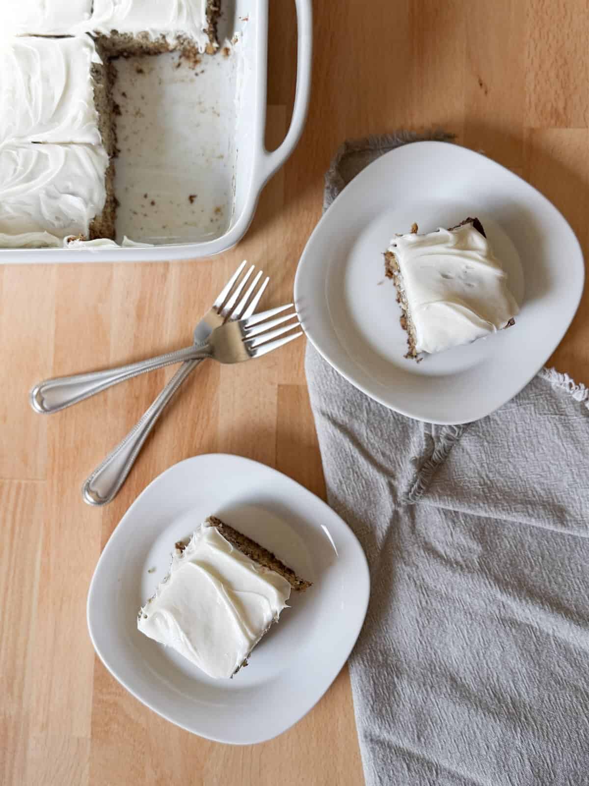 Soft banana bars with cream cheese frosting in a 9x13 baking pan.