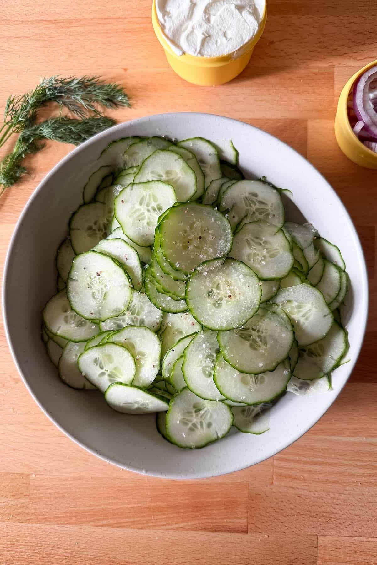 S
Salting cucumbers to prevent watery cucumber salad.
