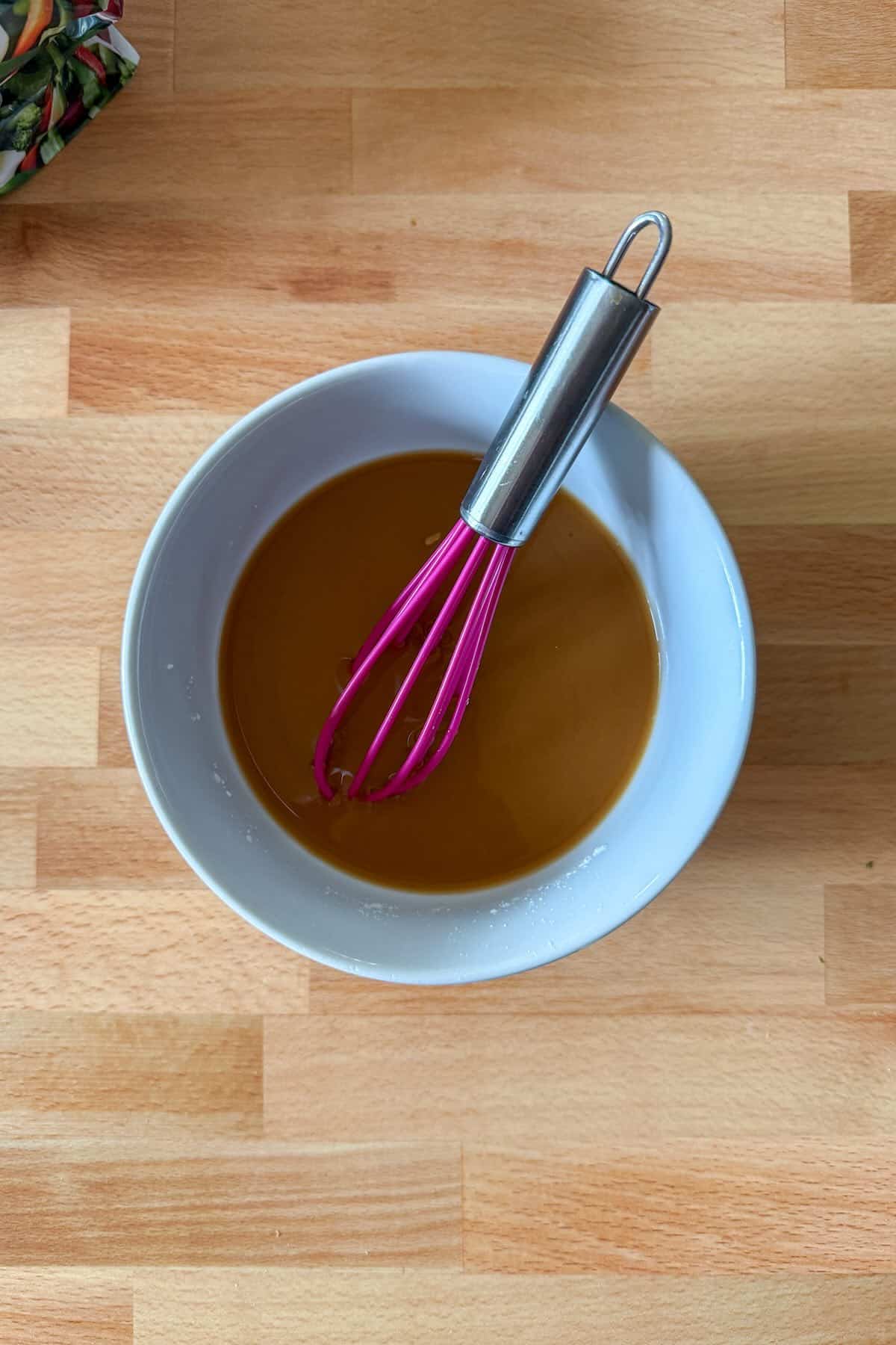 An easy homemade stir fry sauce in a small bowl.