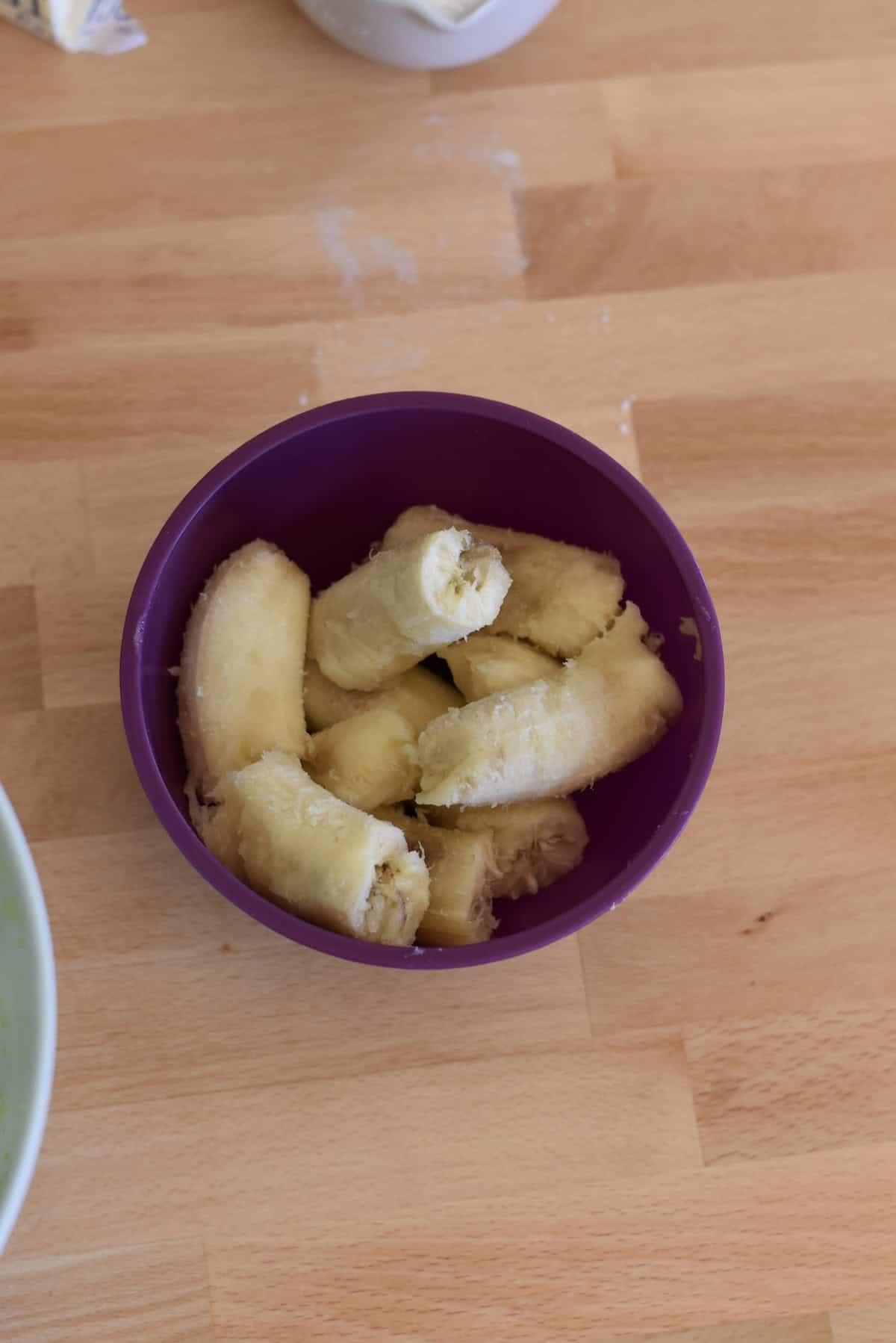 Overripe bananas in a bowl to be mashed.