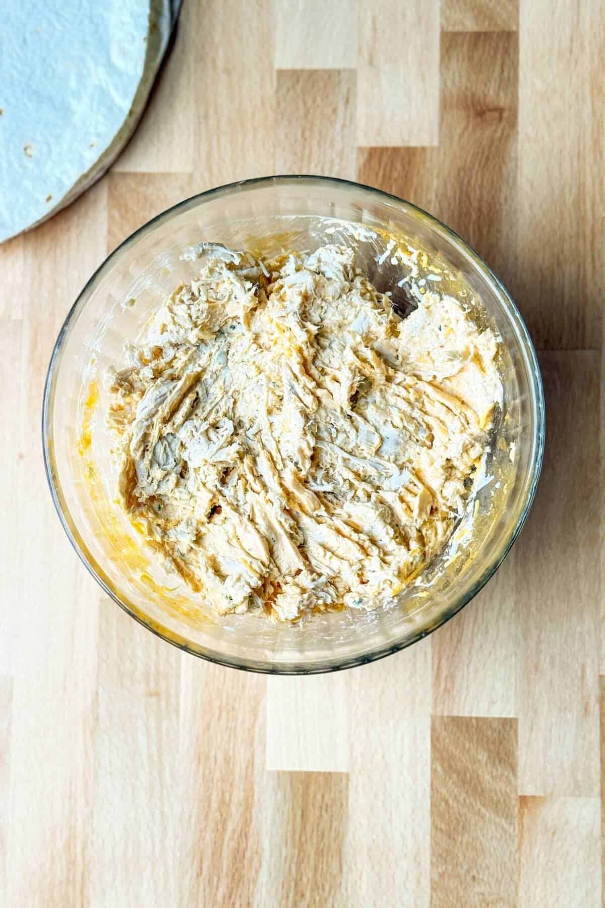 Buffalo chicken filling mixed with cream cheese, ranch dressing, shredded chicken, and buffalo sauce.