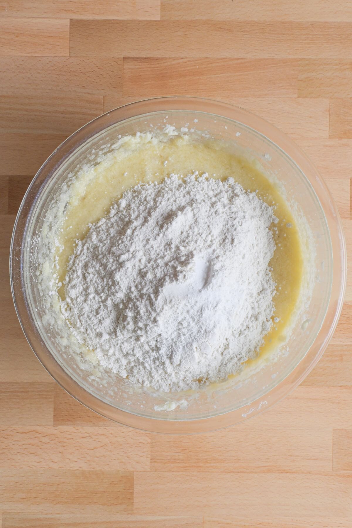 flour mixture being added to the wet ingredients.