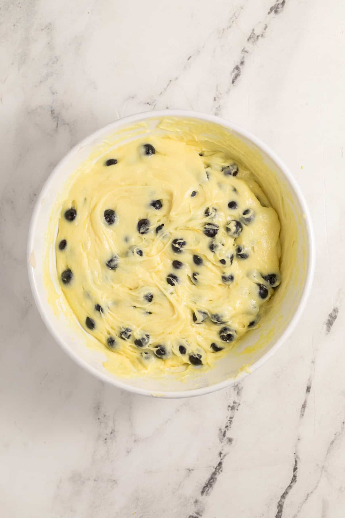 Fresh blueberries folded into lemon cake batter.