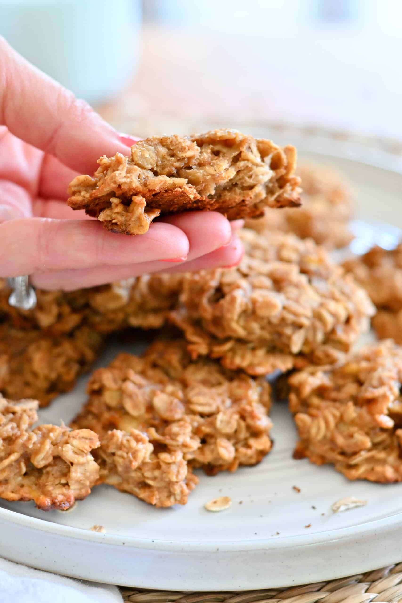 Inside of a banana oatmeal breakfast cookie showing the soft oat and banana texture.