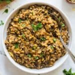Easy Instant Pot wild rice pilaf made with vegetables and herbs.