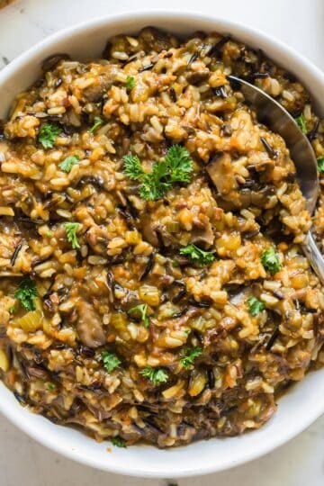 Easy Instant Pot wild rice pilaf made with vegetables and herbs.