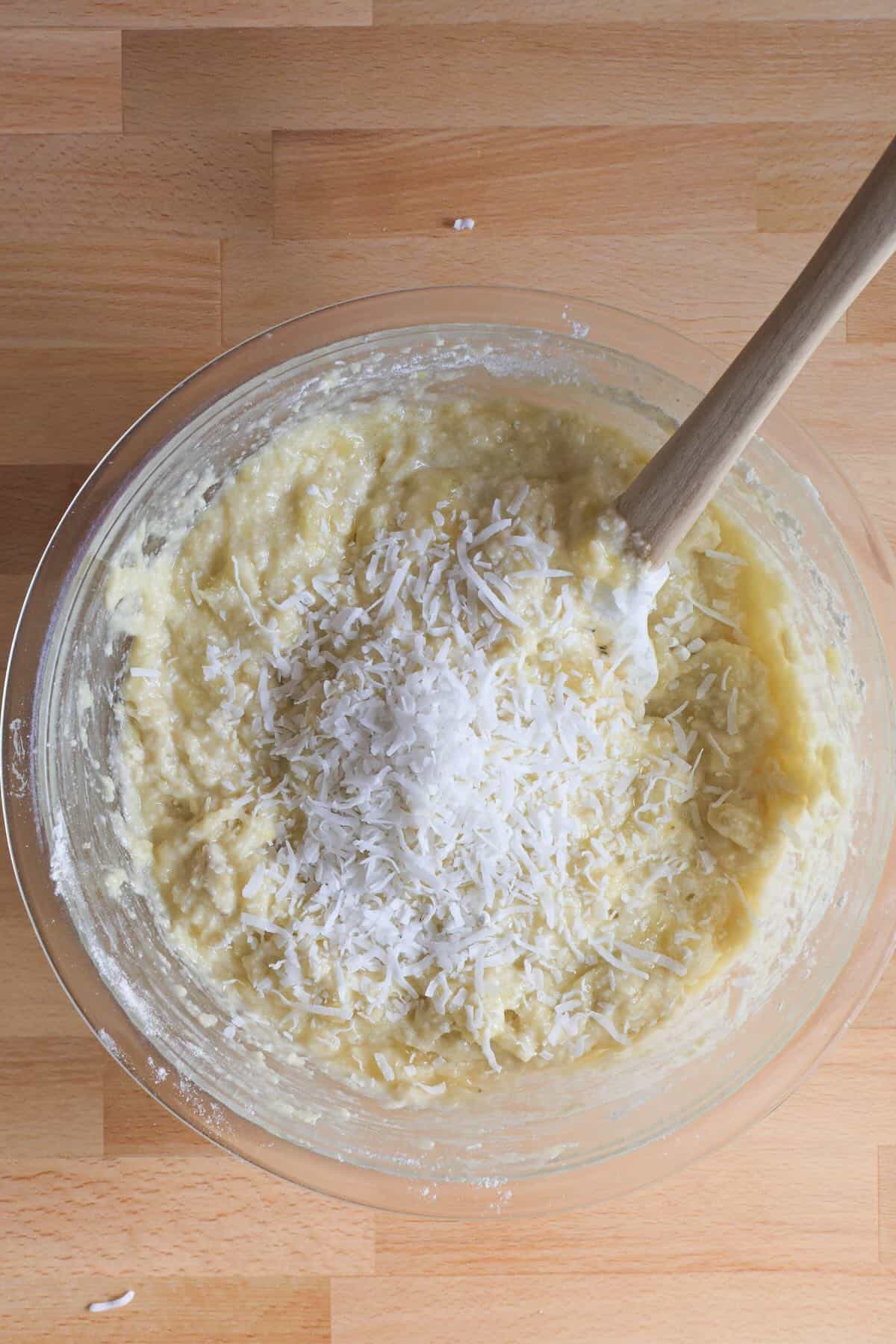 Shredded coconut mixed into Hawaiian banana bread batter.