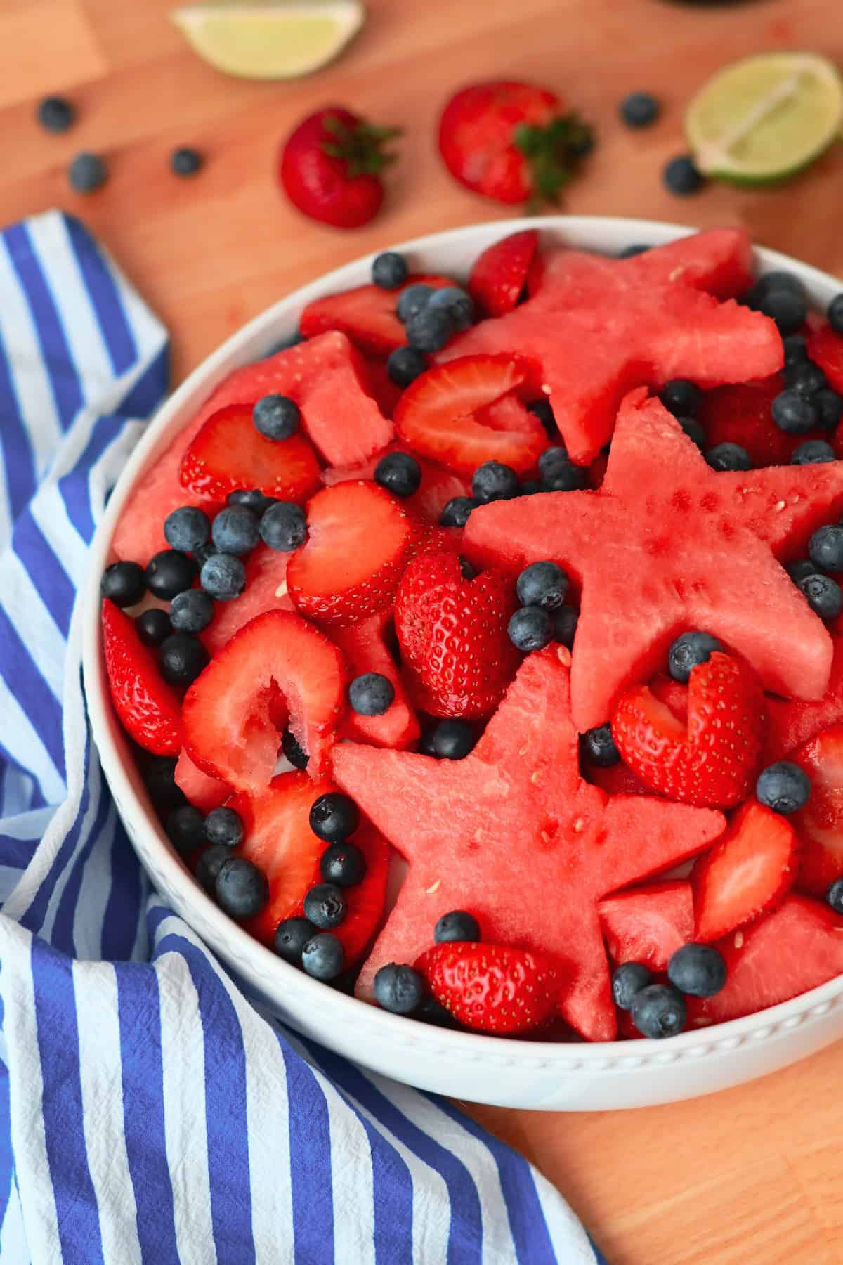 Easy patriotic fruit salad made with fresh strawberries, blueberries, and watermelon stars.